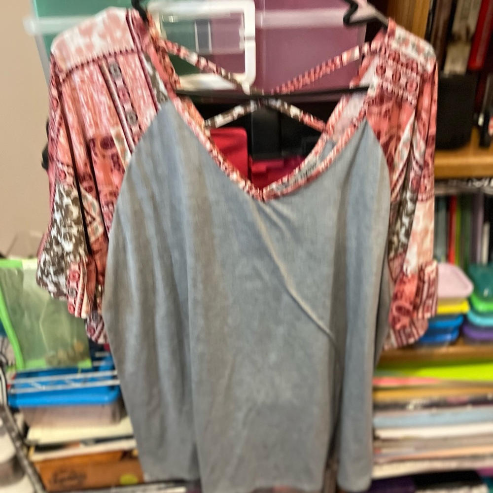 3/4 sleeve grey shirt white flower sleeves and X-string on the back
